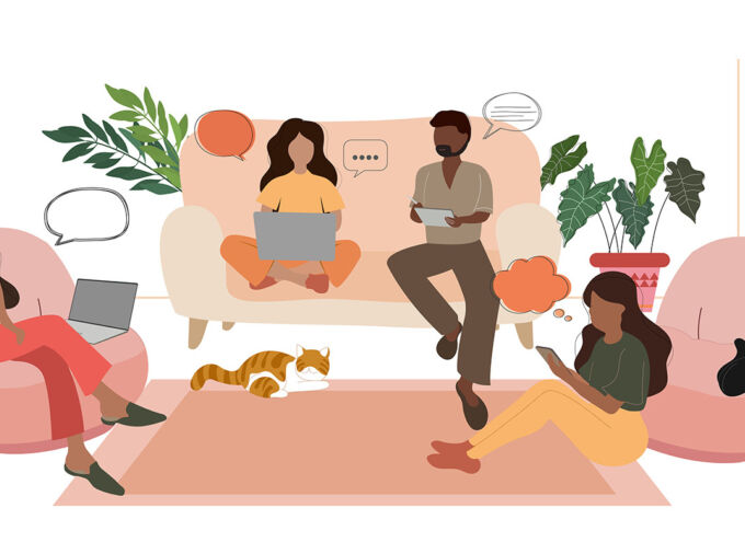four people relaxing in living room with cats and devices