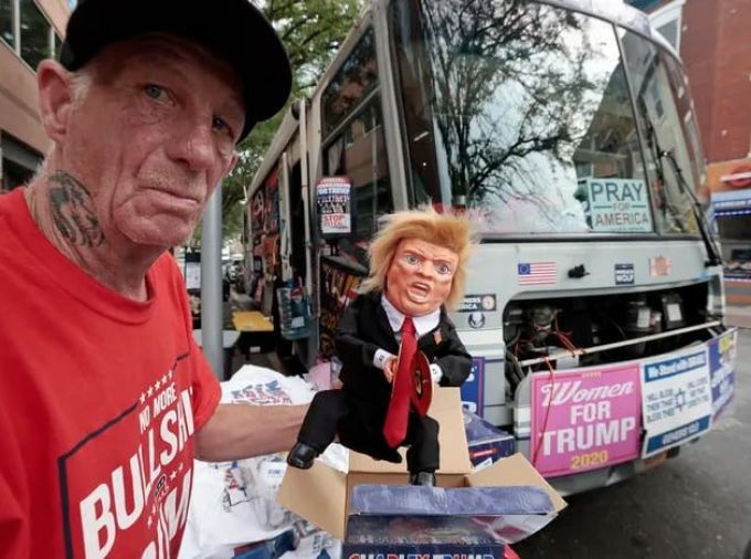 Marc Conger of Old Bridge, N.J., packs up “Charley Trump” and other Trump items for sale outside of the Donald Trump campaign rally the Liacouras Center at Temple University last month.