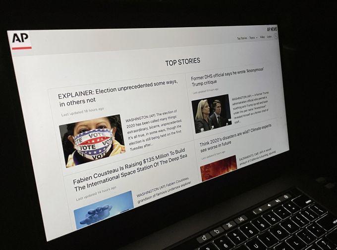 Mock AP news website on laptop screen